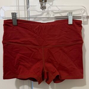 The Barbell Cartel Rust colored shorts